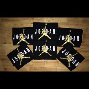 Jordan shirt black gold and white